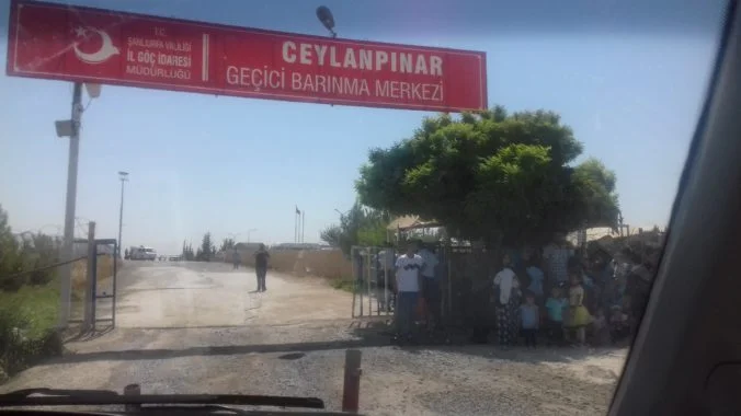 Entrance of Ceylanpınar tent camp. Photo taken in Ceylanpınar by the author on 23 July 2018.