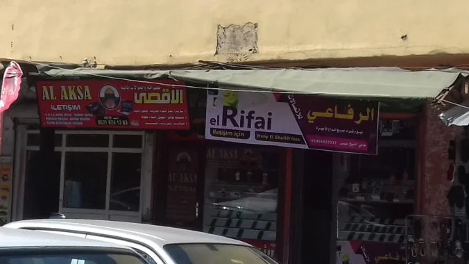 Two cell-phone store owned by Syrian refugees in a neighbourhood where Syrians live in high numbers at the city center of Şanlıurfa. Photo taken by the author on 28 August 2018.