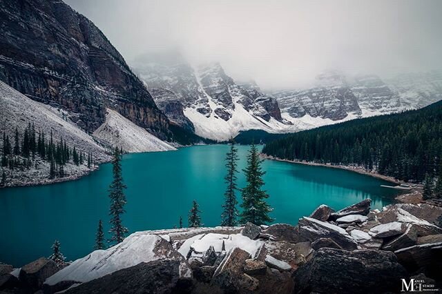 SHROUDED IN MYSTERY 
Moraine Lake in Banff, Alberta. This glaciar fed lake is situated in the Valley of Ten Peaks. Image was taken Fall of 2019. 📷: Nikon D850 and Nikon 14-24mm &copy;Manuel Estacio Photography****************************************