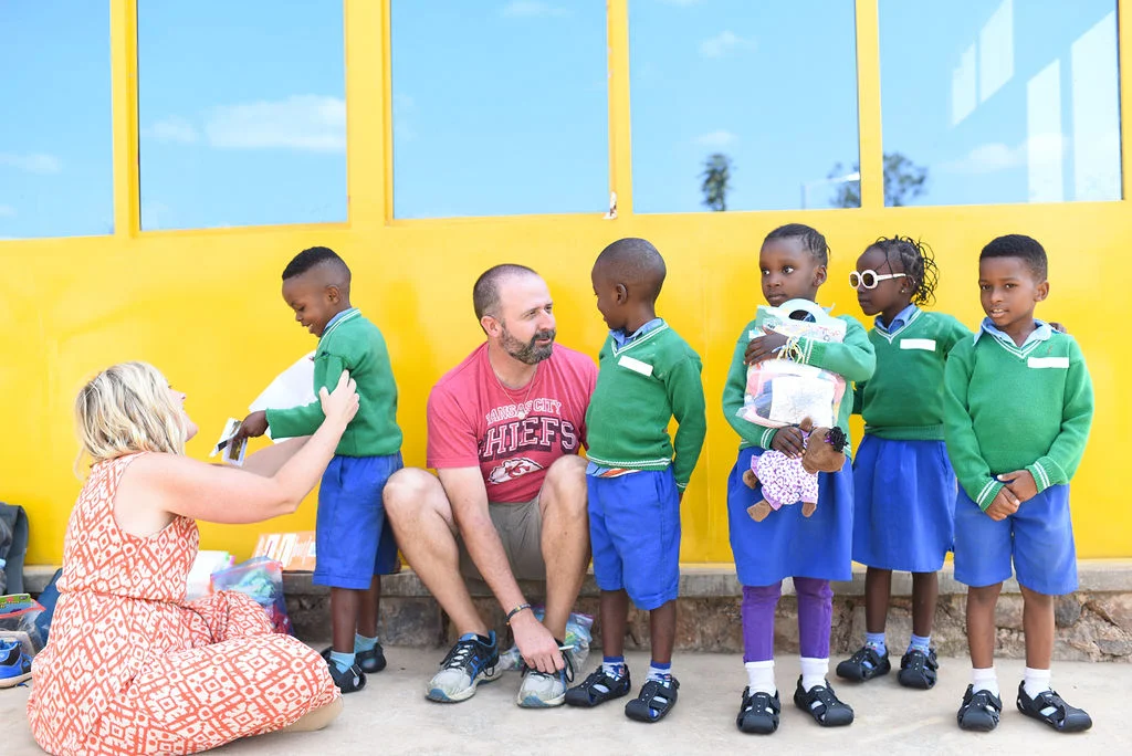 Kara and Ryan Higgins with some of the kids