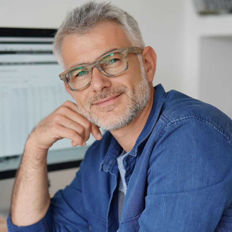 bigstock-Man-at-home-working-on-desktop-242890354.jpg