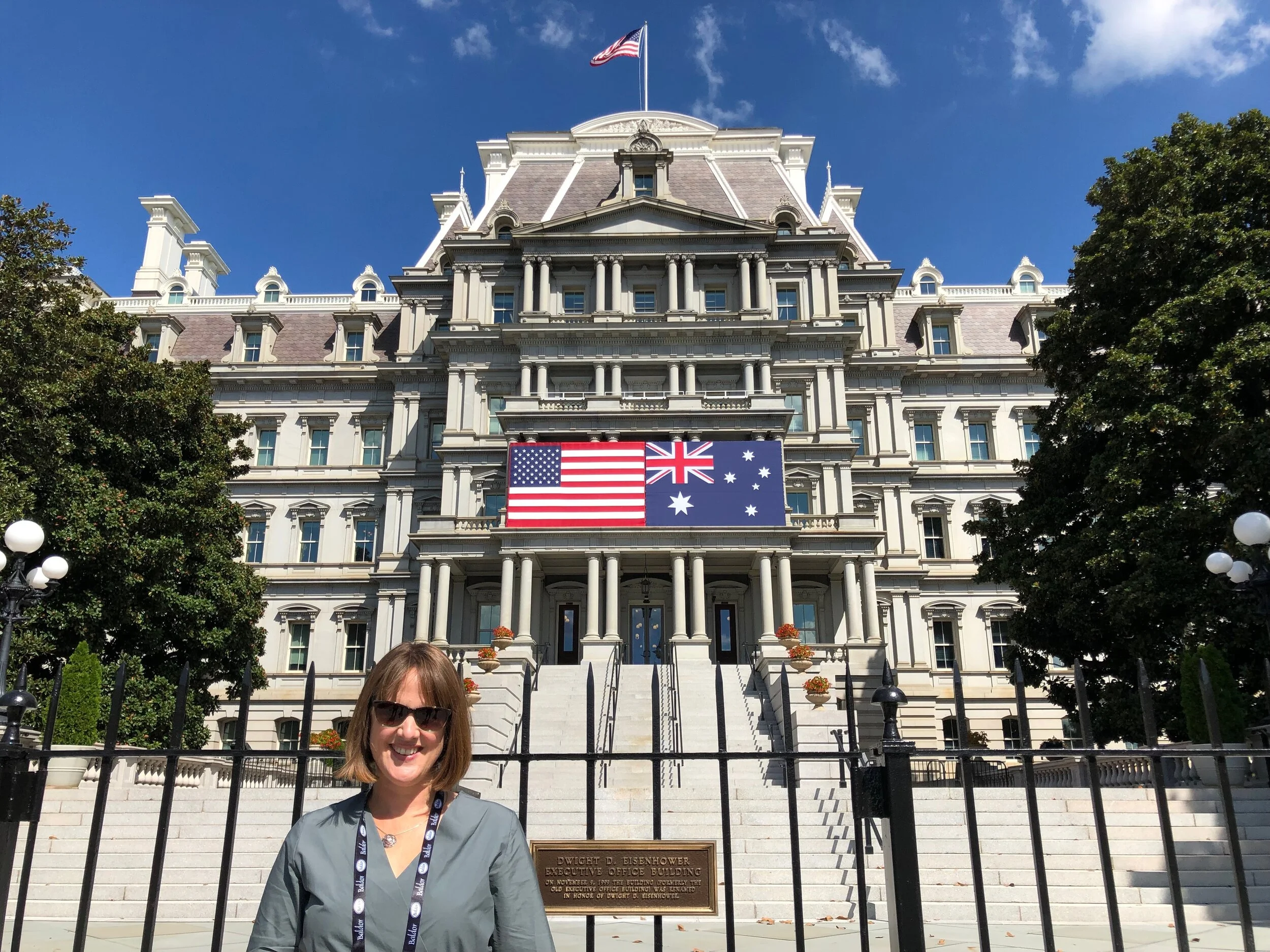 Claire pictured in front of the historic Eisenhower Executive Office Building