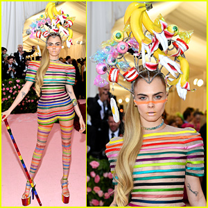 cara-delevingne-wears-rainbow-stripes-to-met-gala-2019.jpg