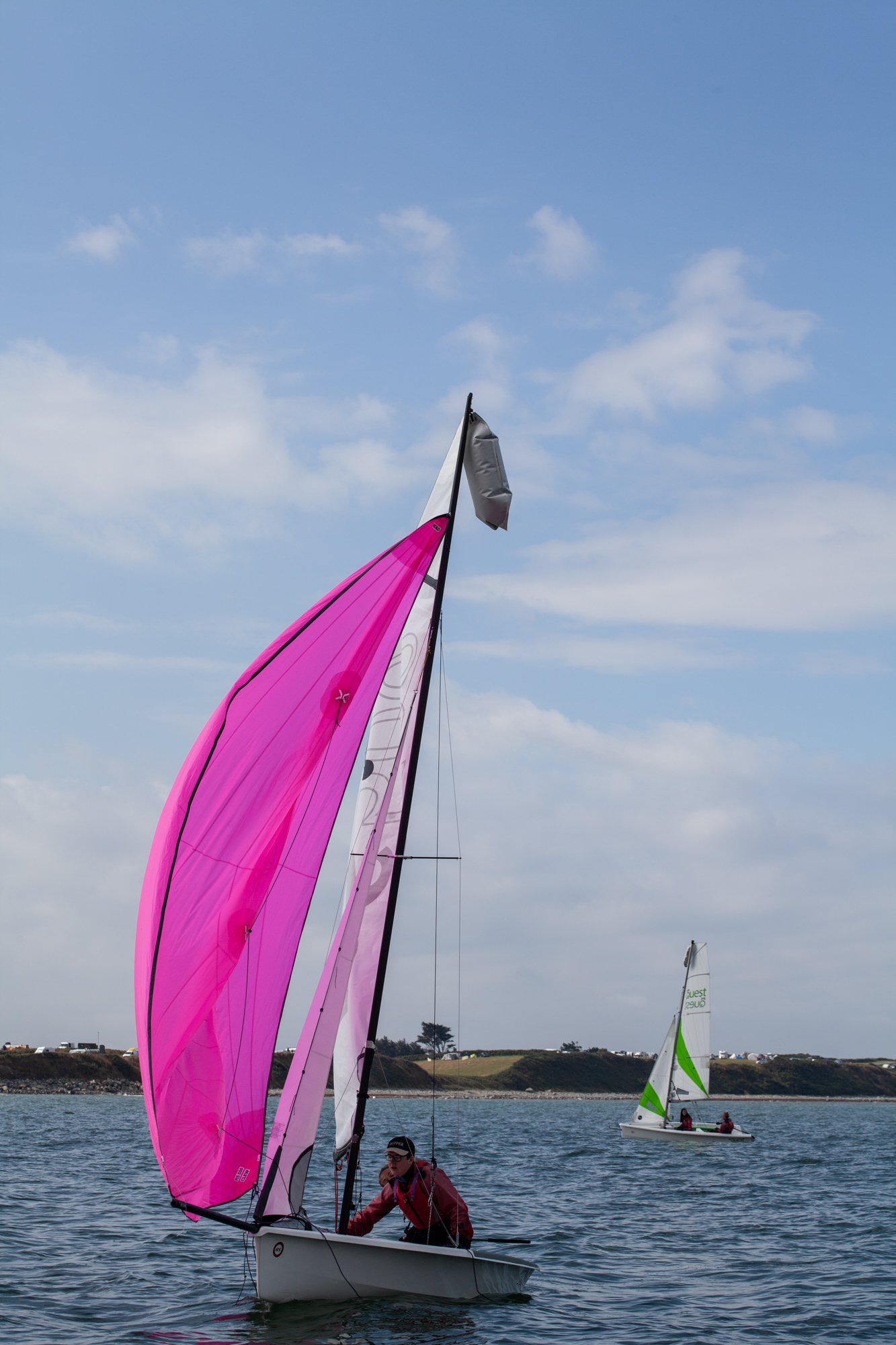 Learning to sail in a pink boat!