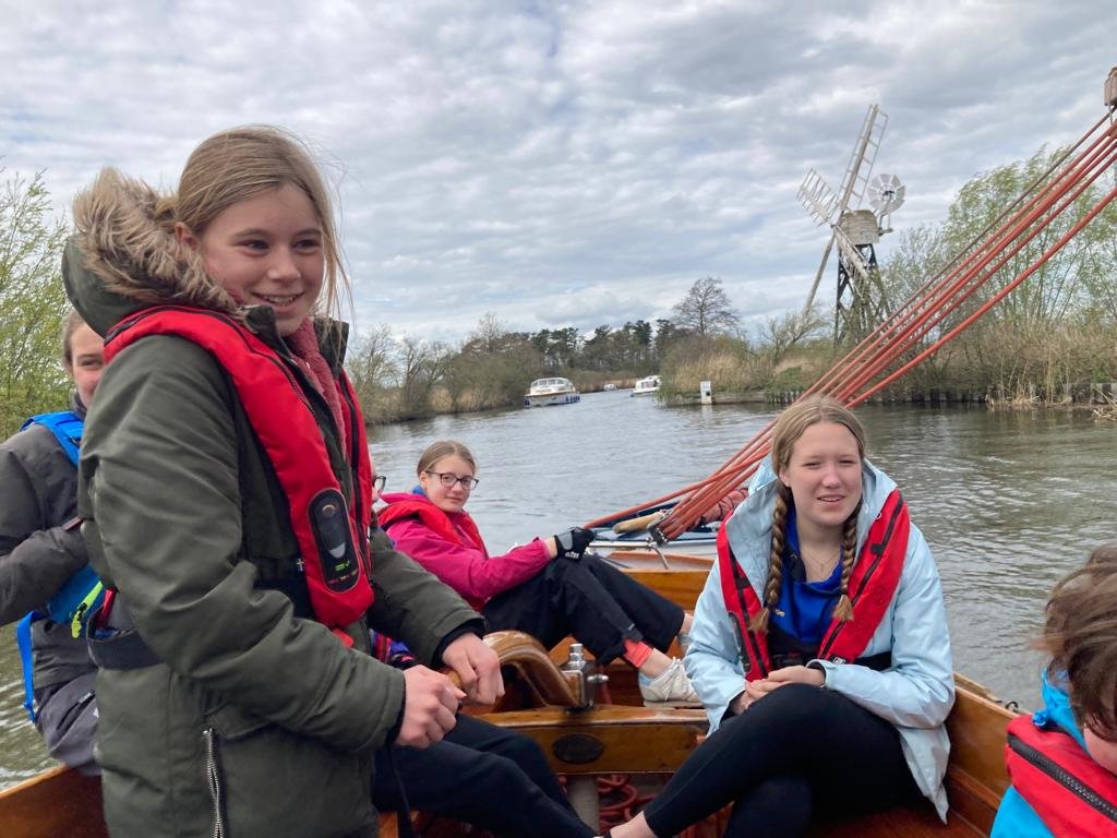 Teenage girls learning how to sail on Christian holiday