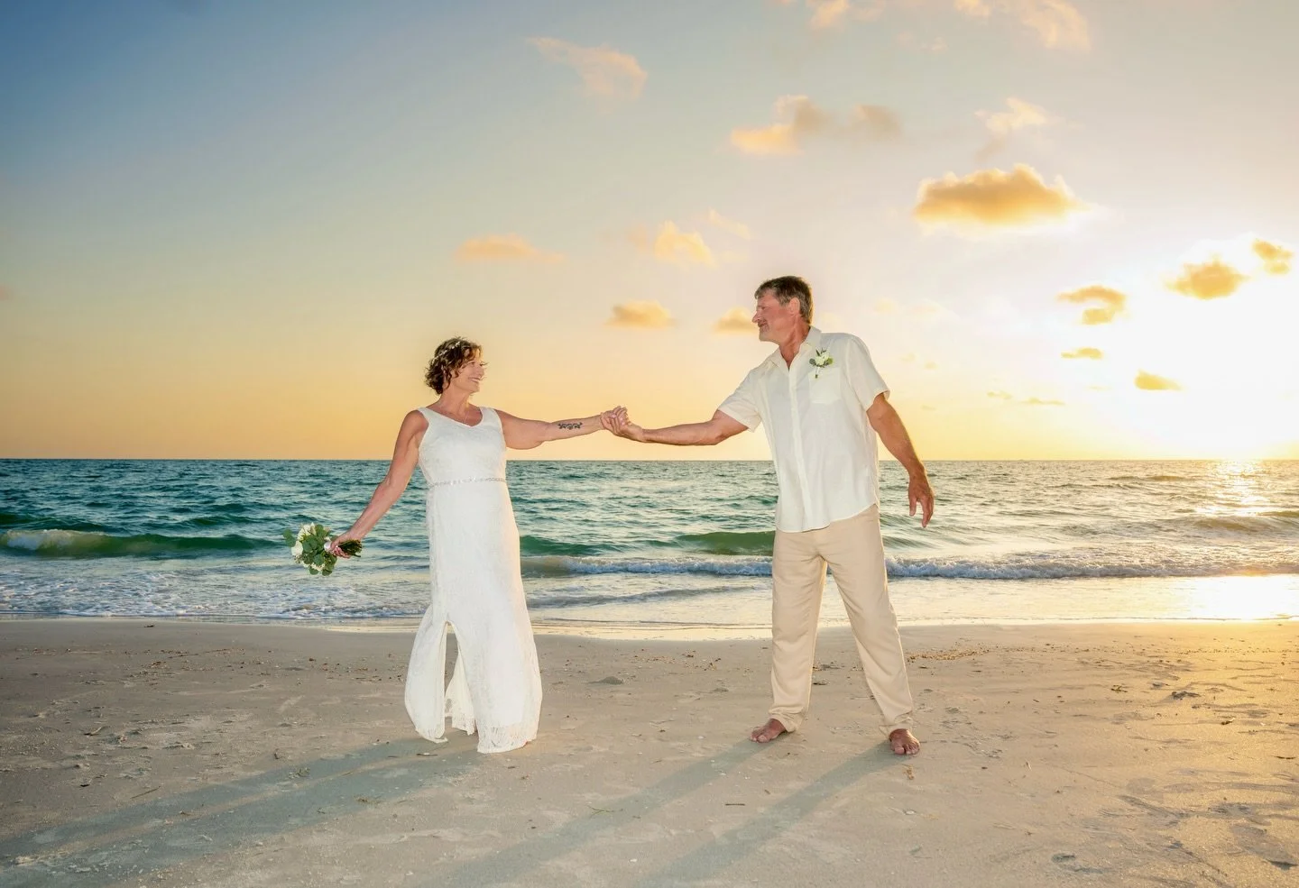 There is something magical about a small intimate wedding at sunset 🌅 🌴 sunsationphotography.com #stpetebeachphotographer #stpeteweddings