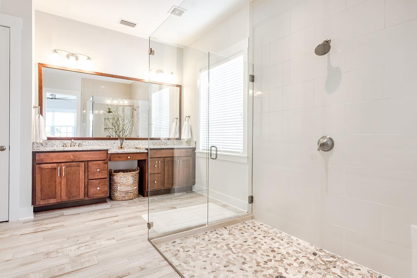 Are you team #shower or team #tub? While we love a beautiful soaking tub, we also appreciate a well-designed shower with plenty of space.

YES, we do stage our bathrooms! That cozy touch of towels and a few details goes a long way in a room that can 