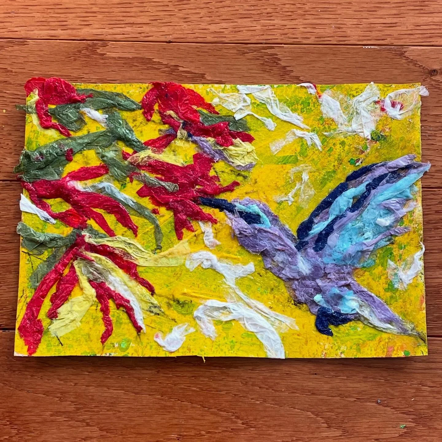 Inktober Day 13- Drink.  A hummingbird takes a drink from a flower by extending a long forked tongue and performing a rapid movement 10-15x per second to efficiently drink.  Amazing!
I created this with ripped tissue paper and a soft gel from Golden 