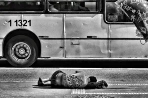 laying-on-sidewalk-300x200.jpg