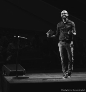 Man-Talking-on-Stage-copy-cropped-280x300.jpeg