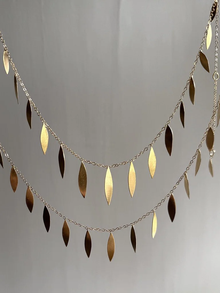 leaves gold silver necklace charm dainty slinky artistic artisan Devon Totnes handmade elegant modern gold plated satin fine jewellery handcrafted