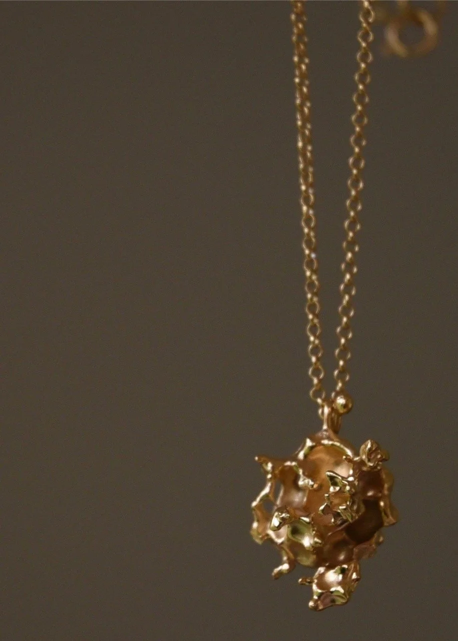 gold necklace pendant charm coral organic natural Devon Totnes sculptural modern edgy statement piece handcrafted artisan molten metalsmith