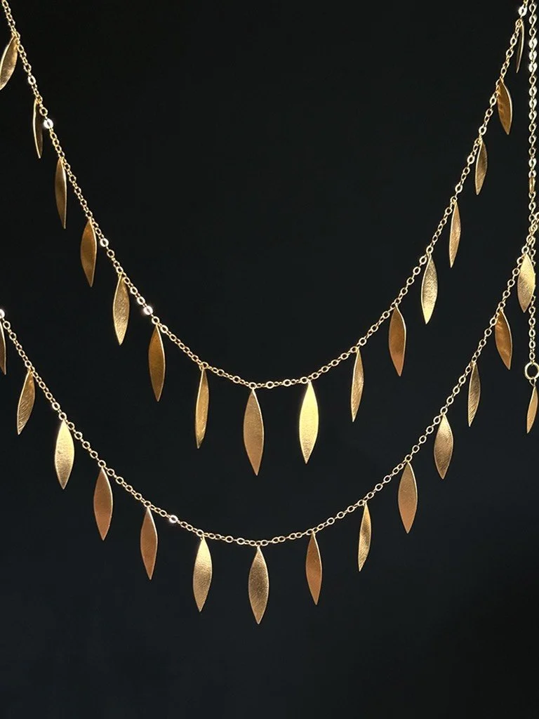 leaves gold silver necklace charm dainty slinky artistic artisan Devon Totnes handmade elegant modern gold plated satin fine jewellery handcrafted