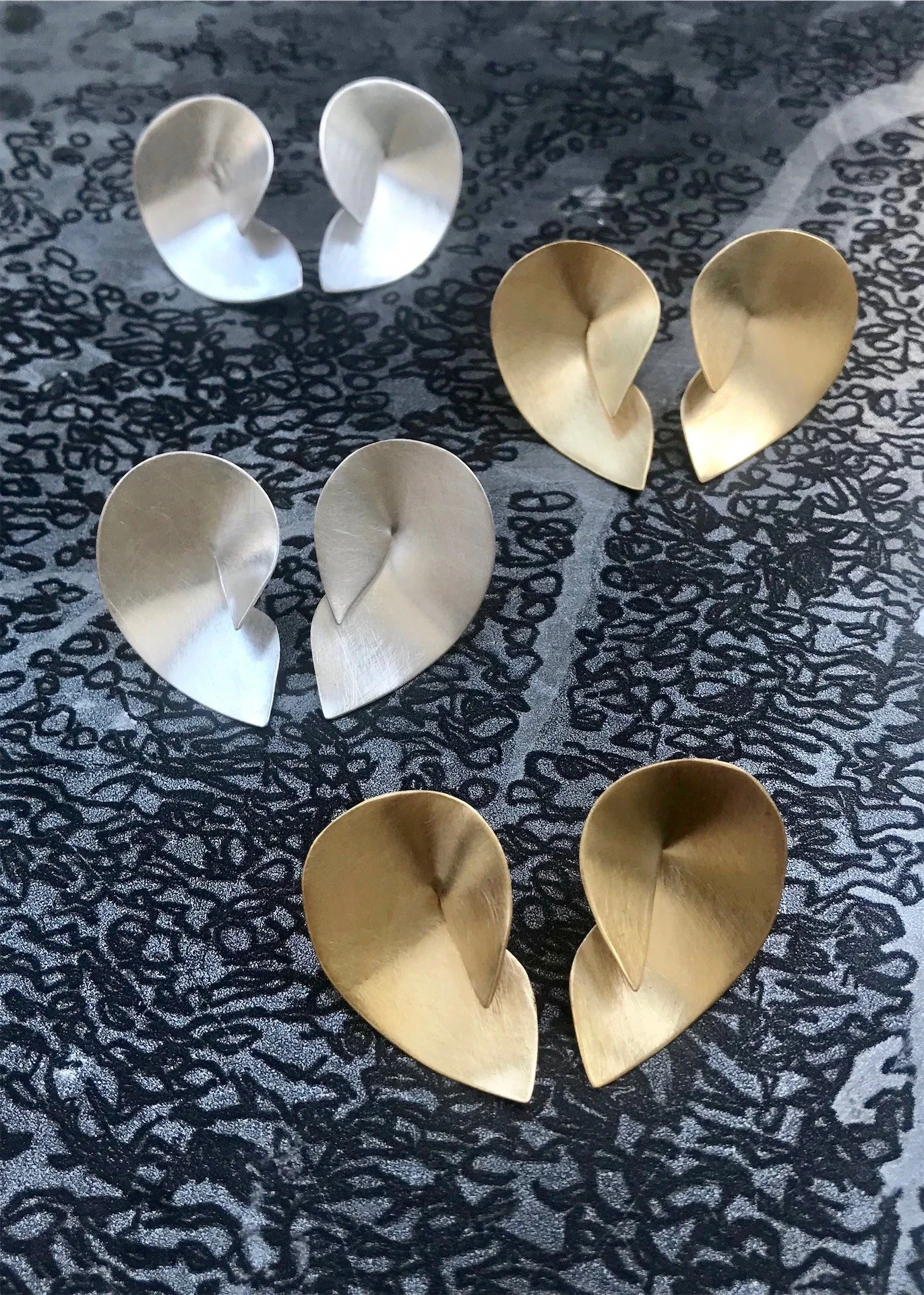 gold silver earrings shell smooth modern minimalist sleek handmade seashell elegant refined everyday wear