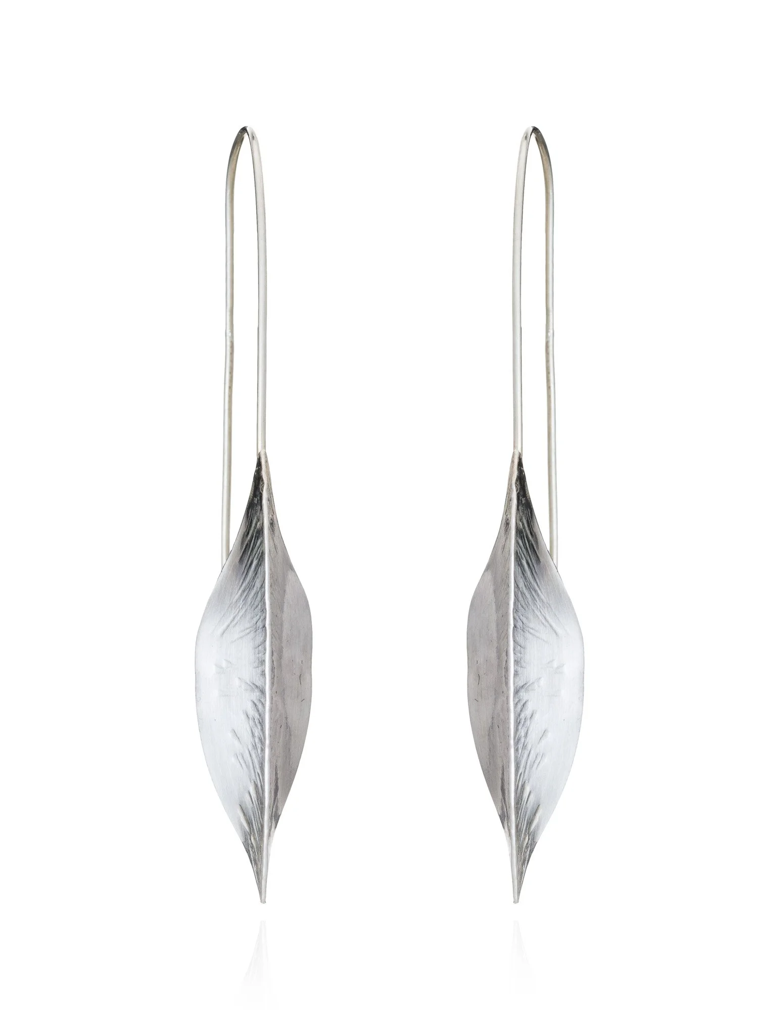 Sofie earrings handmade by Lucy Behrens in silver or gold, delicate scored leaves