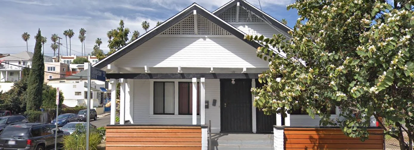 The exterior of Myriam’s house was recently renovated, as the new landlord hopes to force her to leave so that higher paying tenants can move in.