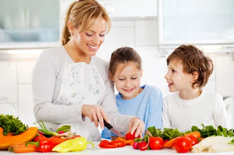Mother-and-children-cutting-vegetables.jpg