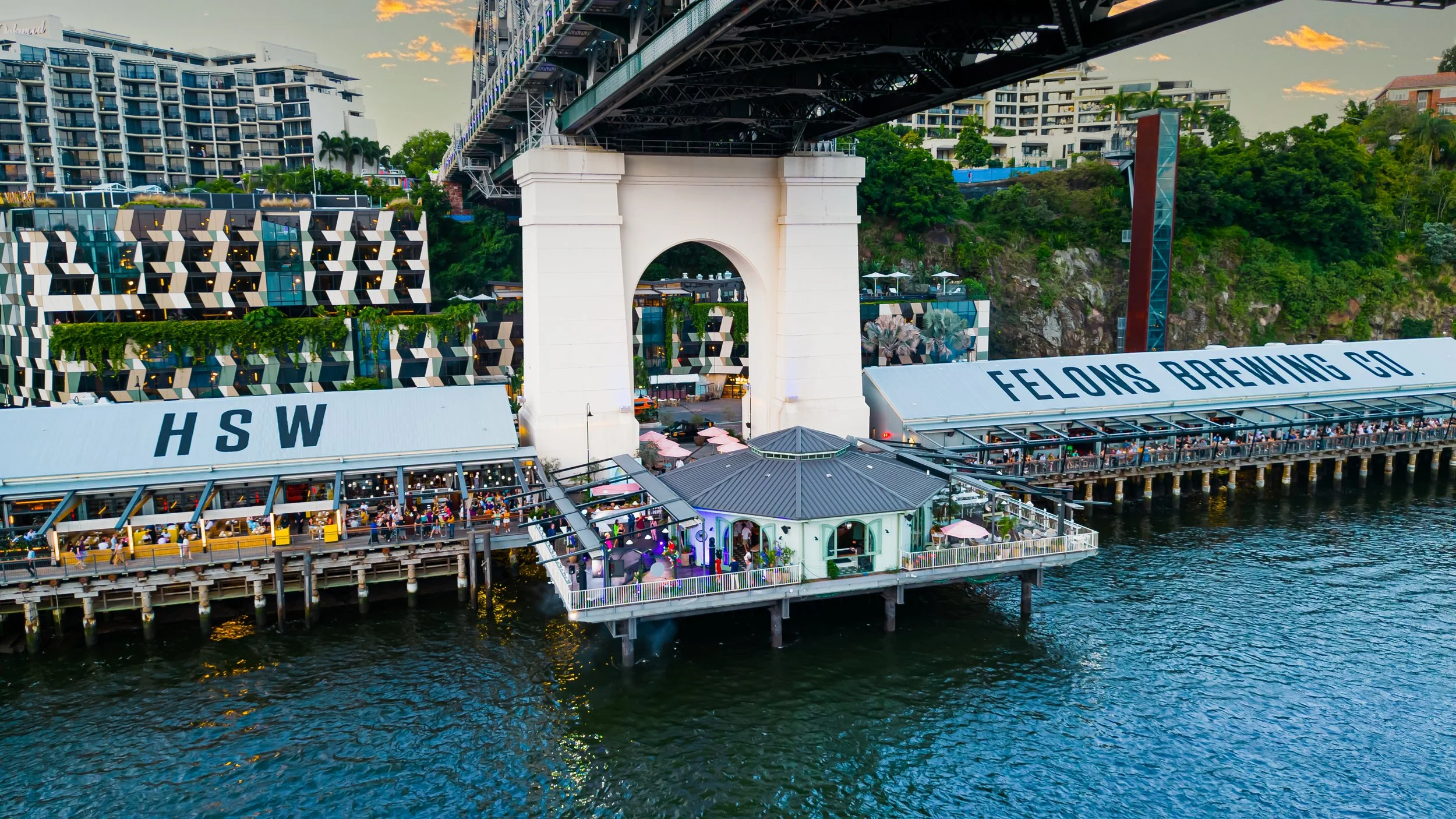 Aerial view of Mr Percival's floating on the Brisbane River beneath the Story Bridge