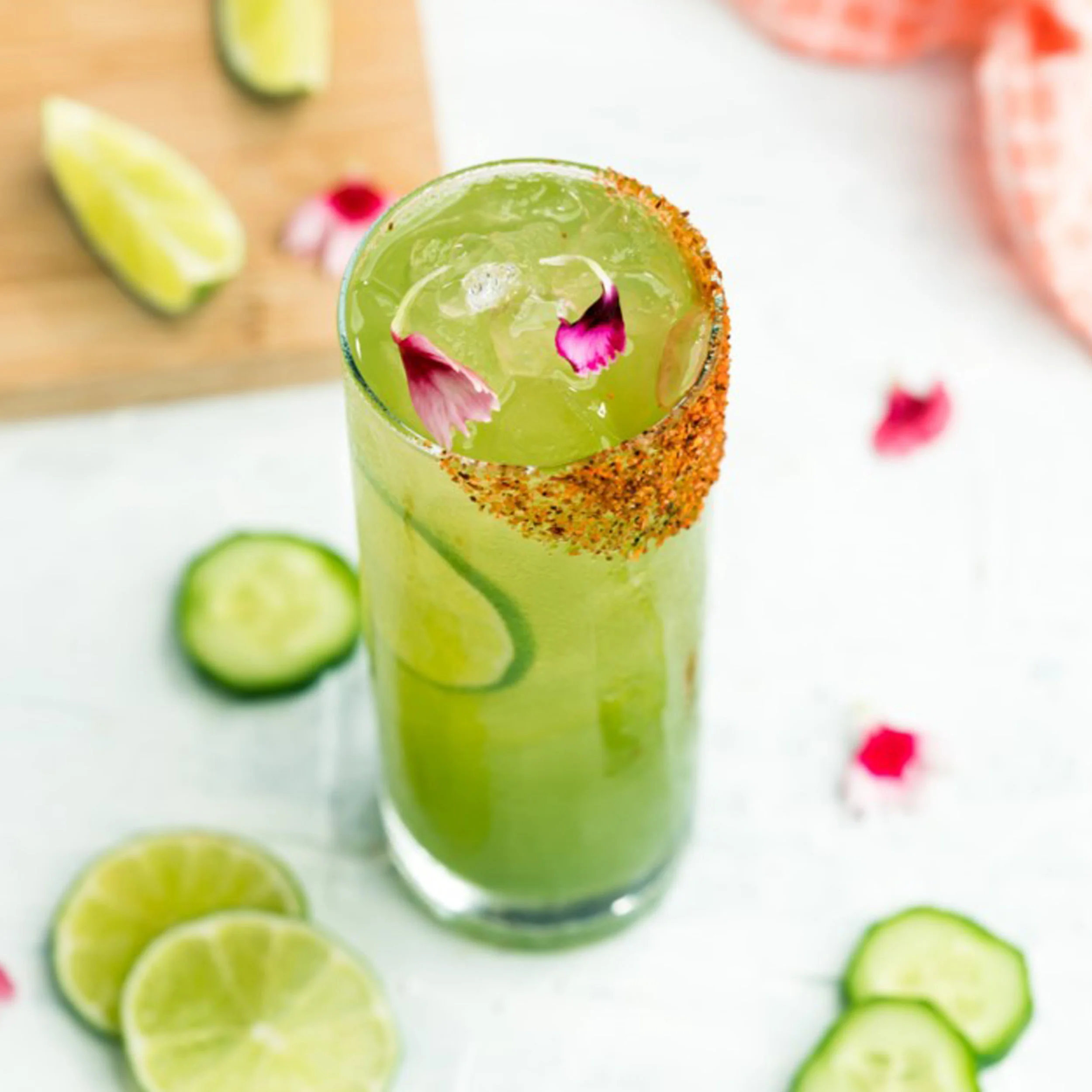HAMMOCK HOPPER 1.5 oz PAU Maui Vodka .5 oz dry vermouth .25 oz Kalani Coconut .25 oz simple syrup .75 oz lime juice .75 oz cucumber juice 2 dashes of orange bitters Combine all ingredients into a shaker tin and shake vigorously for 8 seconds. Fine strain into a Collins glass with a Tajin rim. Add ice to the top and garnish with two cucumber wheels. Styled: @thesocialsipper