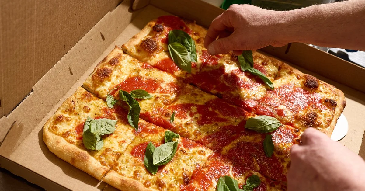 Final Touches on a Grandma Pizza.jpg