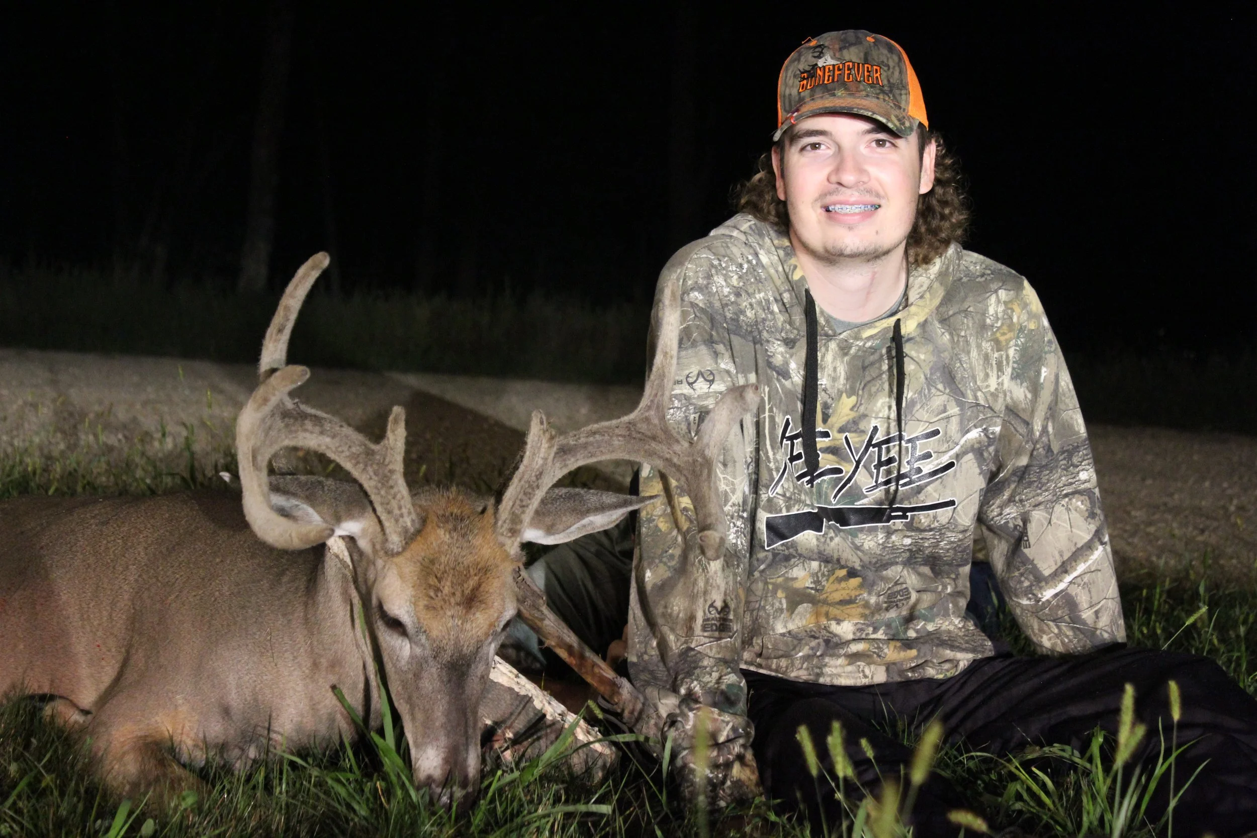 Hunter Brandon Ferris with buck.JPG
