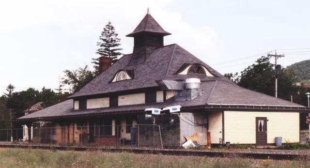 The east end, shows the obvious location of the kitchen. Note the refrigeration units for meat coolers and the giveaway smoke exhaust blower over the grill.