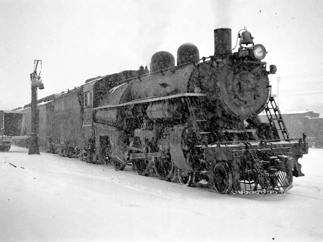 D&H 523 TYPE: 4-6-0 CLASS: D-3a DATE: 1/1/48 LOCATION: Oneonta, NY NOTES: At passenger station with Albany-Binghamton local. PHOTOGRAPHER: Jim Wright