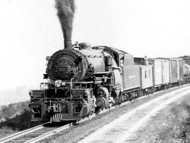 D&H 1610 TYPE: 0-8-8-0 CLASS: H DATE: 1946 LOCATION: Binghamton, NY NOTES: Pushing northbound freight. PHOTOGRAPHER: Charles Elston, (Jim Wright Collection)