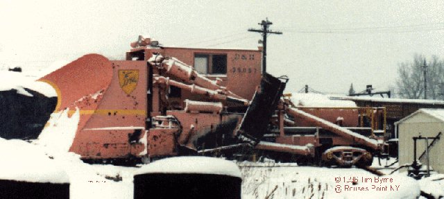 D&H 35057 Jordan Spreader #35057, or so it appears. This unit was photographed by Tim Byrne at Rouses Point during a snow storm in 1982.