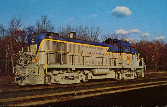 D&H 4128 Typical of one of the popular types of locomotives in the first generation of dieselization was the ALCo road switcher, the 1600 hp RS-3. Unit #4128, built in Aug, 1953, was the second to the last of the 130 road units that ended the age of steam on the D&H. November, 1971. Jim Shaughnessy photo
