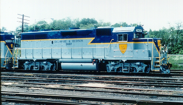 D&H 7407 Sporting a brand new paint job, unit #7407 (and sister #7418) are shown in the final D&H paint scheme at Kenwood Yard, Albany, NY in May 1990. Bill Mischler photo