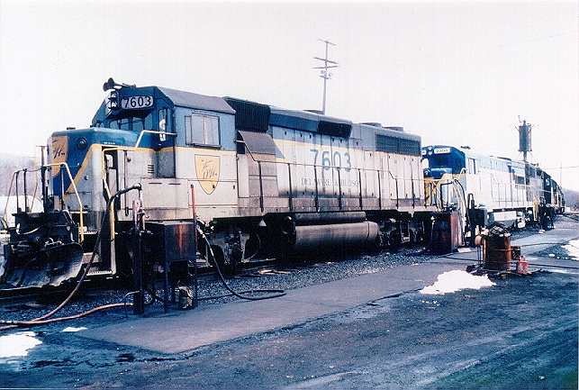 D&H 7603 Unit #7603 is shown at the refueling point at Mechanicville, NY in April 1982, sporting a revised lightning stripe scheme with large side numbers. Bill Mischler photo