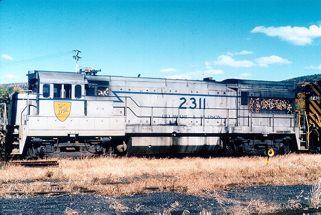 D&H 2311 Know by railfans as the 'Grey Ghost', at a time when the predominant color in the D&H was blue, someone decided to use the surplus grey paint at Colonie, and #2311 is the result. At Oneonta, NY in October 1981. Bill Mischler photo