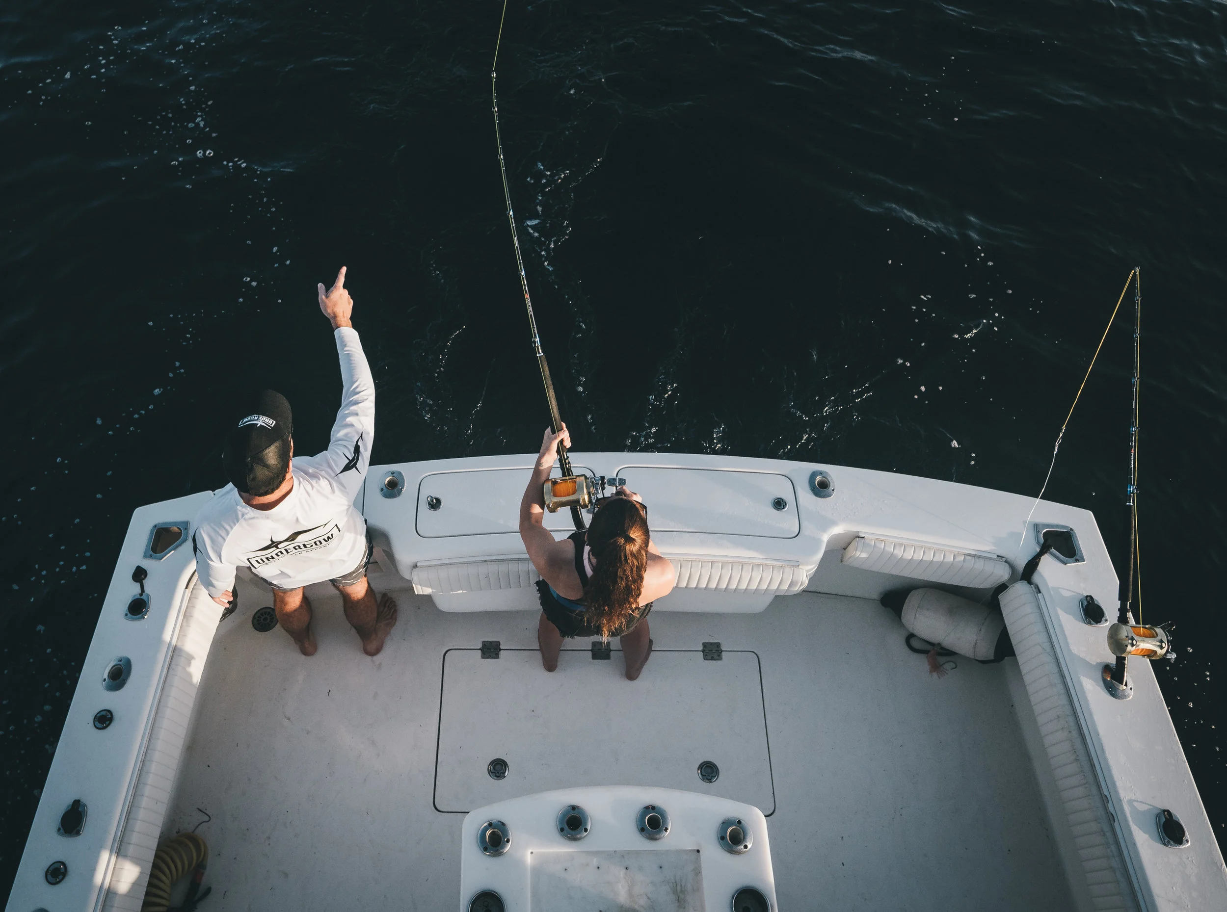 looking down pointing at fish.jpg