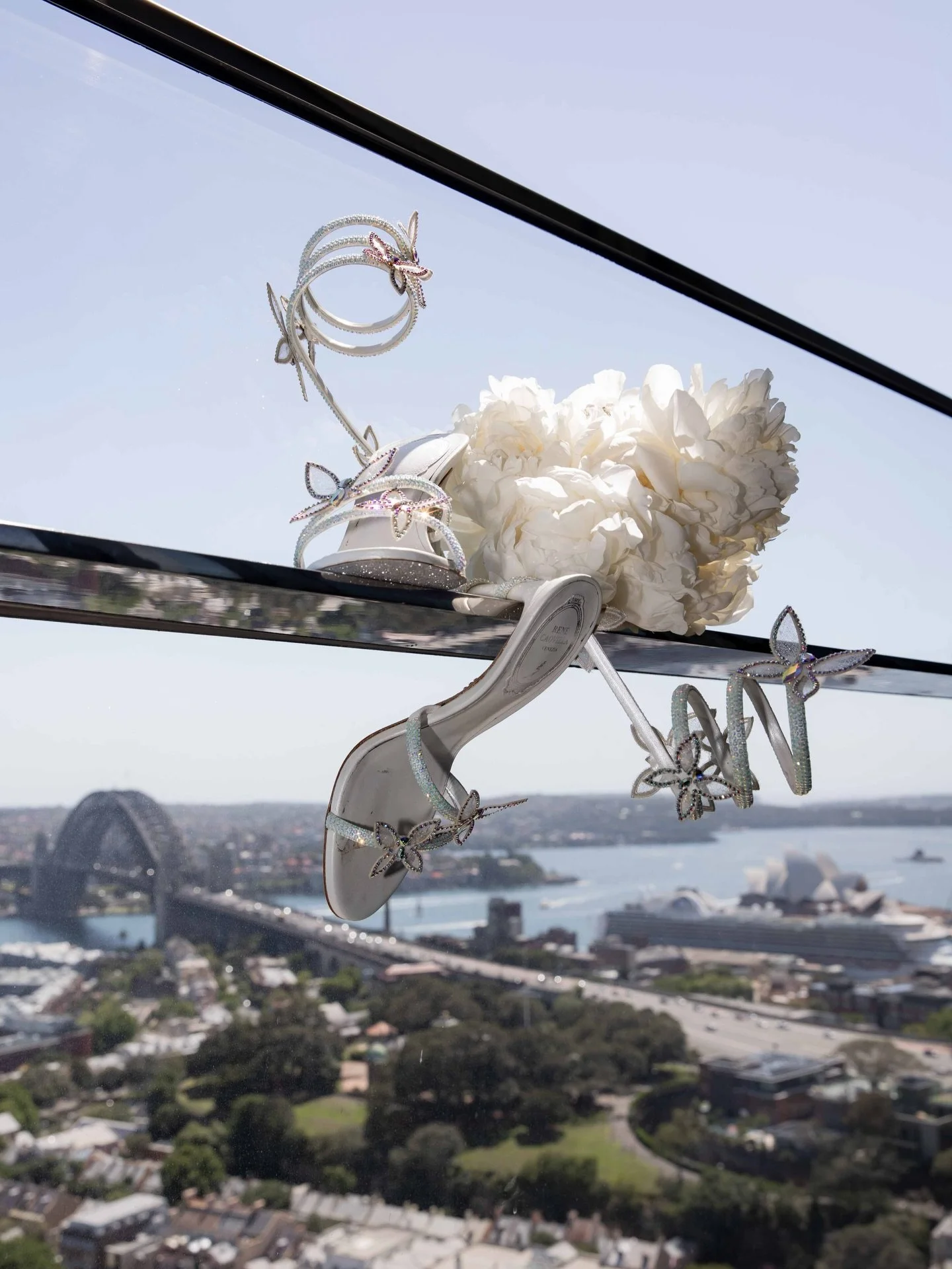 One year ago today &mdash; Angela &amp; Marcus at Crown Sydney 🤍
A timeless moment that sums up everything I love about modern editorial wedding photography: soft natural light, clean architecture, and a couple completely lost in their day.

Capturi