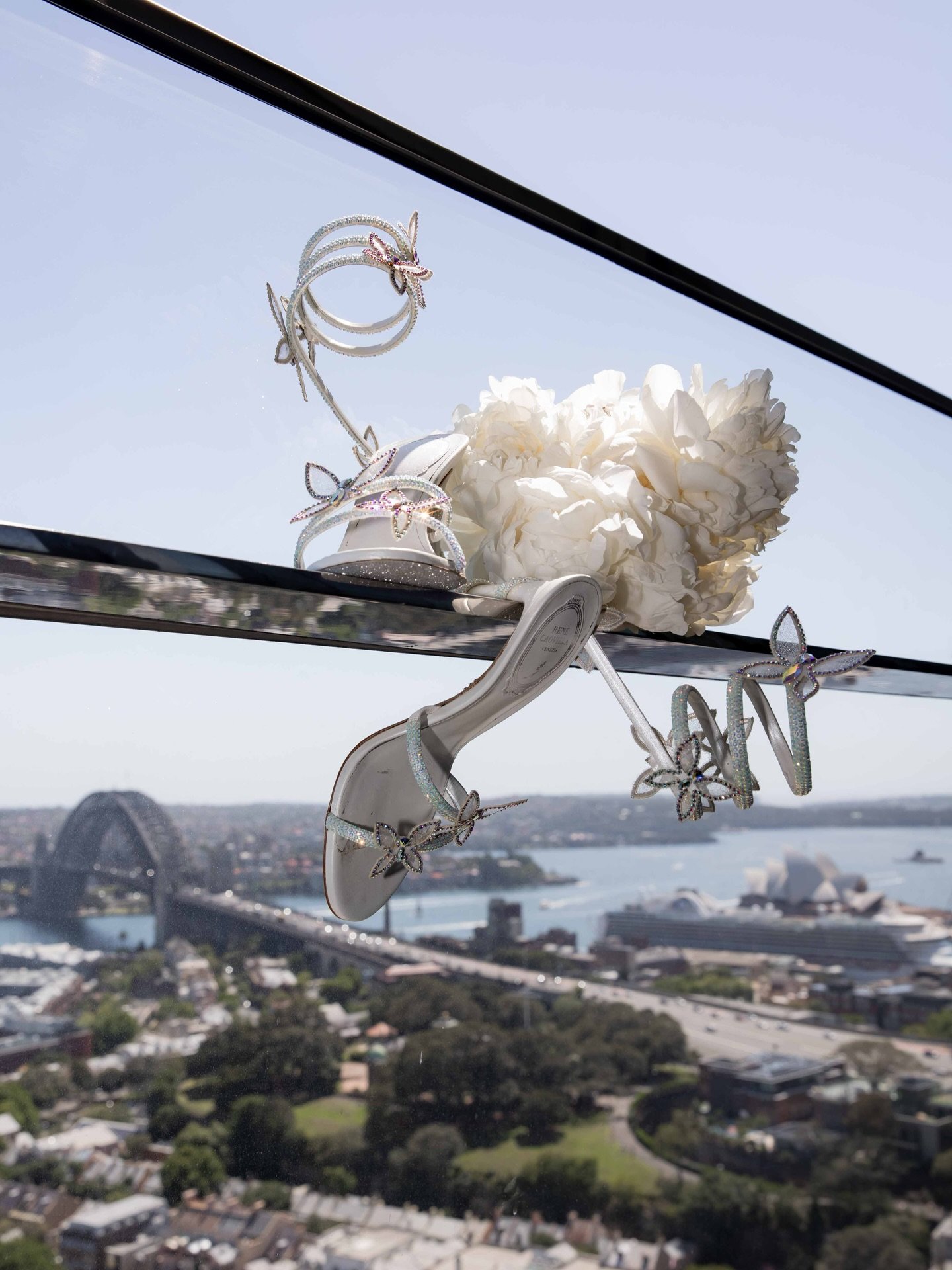 One year ago today &mdash; Angela &amp; Marcus at Crown Sydney 🤍
A timeless moment that sums up everything I love about modern editorial wedding photography: soft natural light, clean architecture, and a couple completely lost in their day.

Capturi