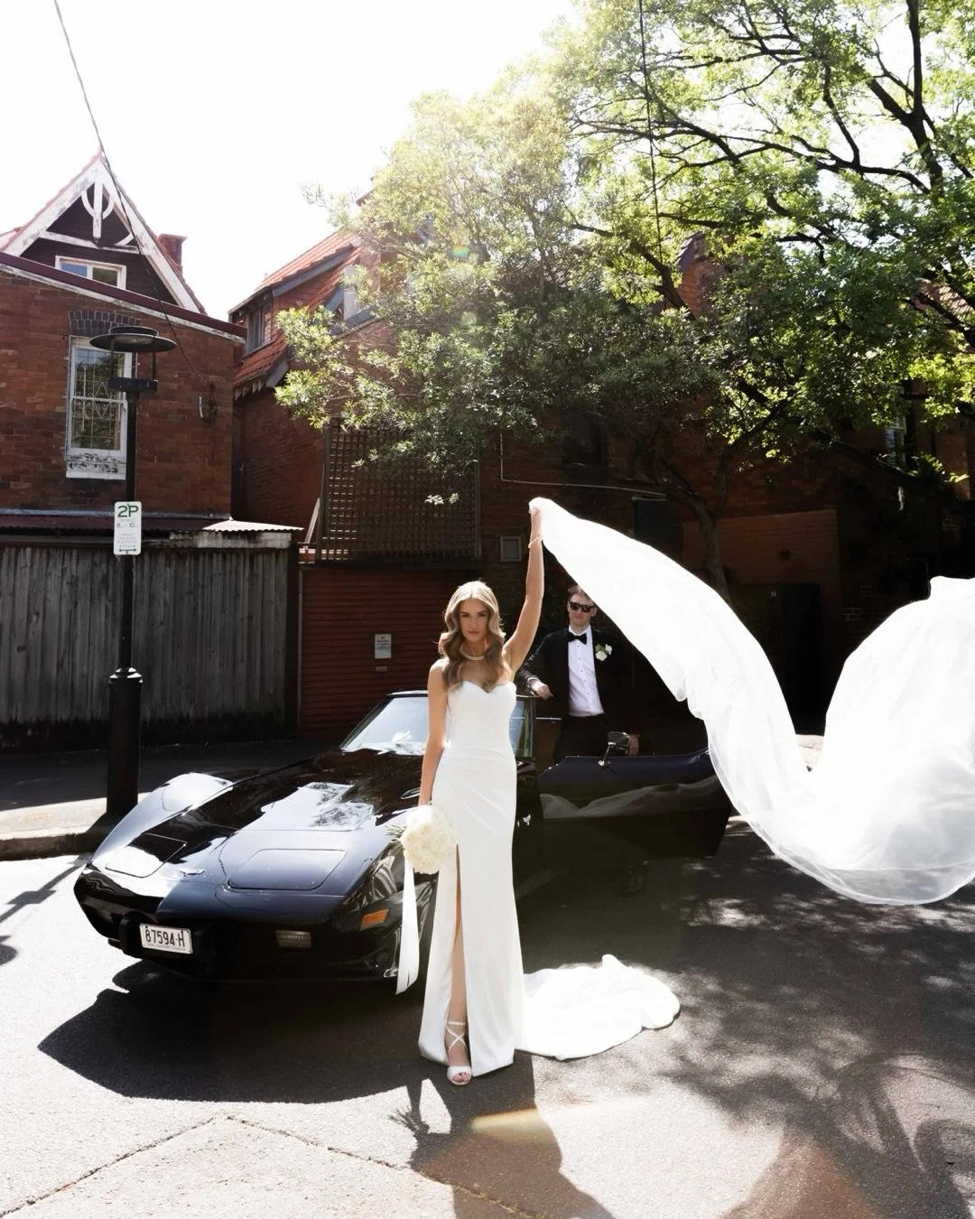 Black-tie, vintage coupe, veil in the wind &mdash; then straight to the Opera House. Clean frames, big energy.
Nothing staged &mdash; just directed enough to feel effortless.
🏷️ 
Sydney editorial wedding photographer
Black tie wedding
Vintage car we
