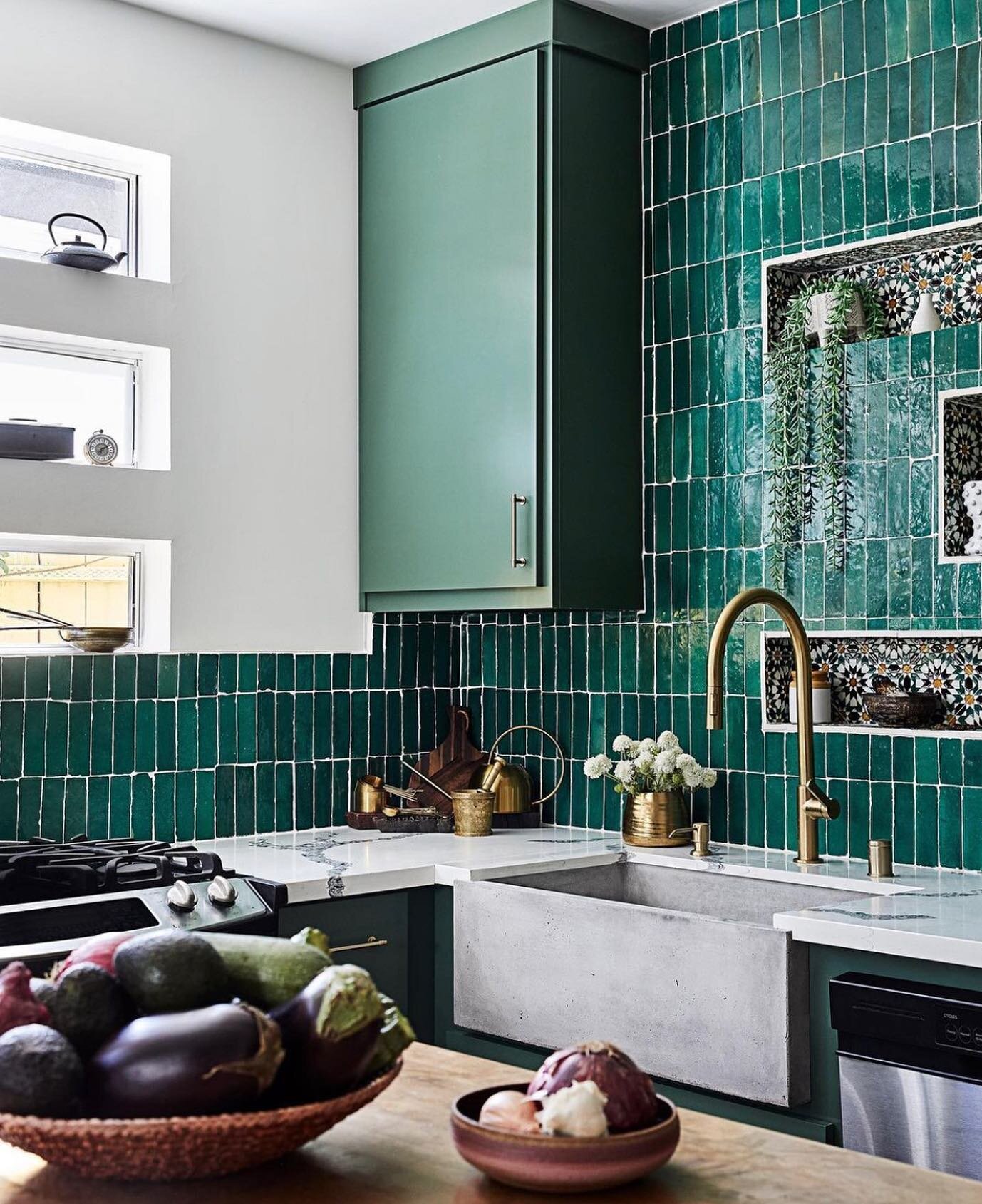Colour can be added to your kitchen in so many different ways.
Re-tiling your backsplash or just adding a bowl of aubergines!
Let your kitchen reflect your personality as much as all of the other rooms in your home.
And if you&rsquo;re a bit stuck as