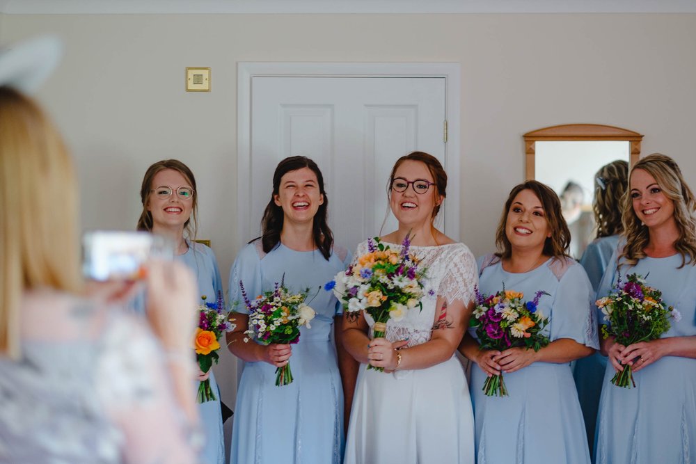 Bridesmaids in baby blue dresses