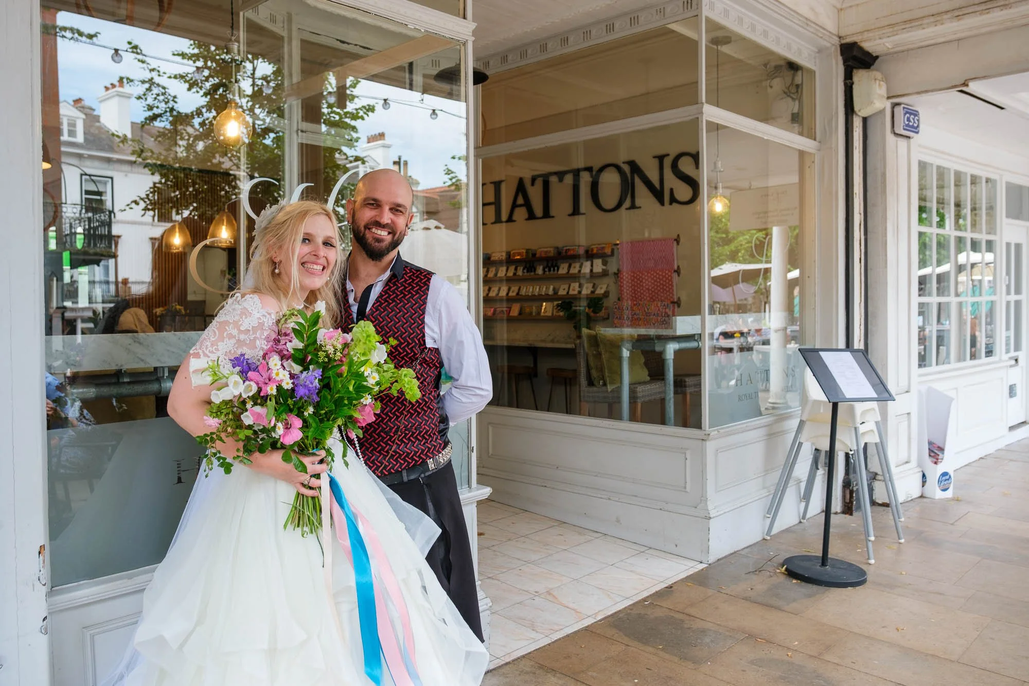 Bride and groom in front of Hatton's Tea room in tunbridge wells