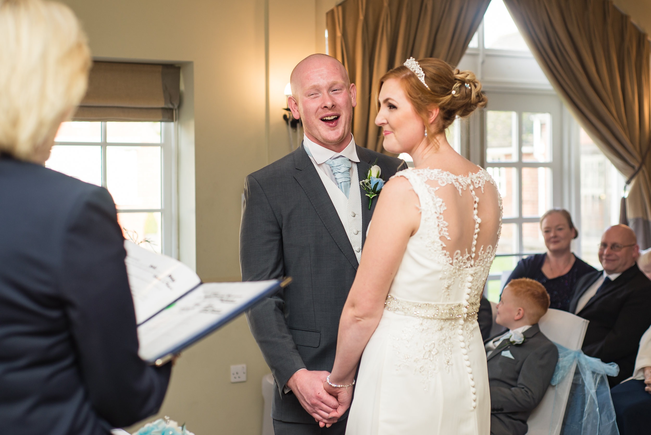 wedding photography and wedding videography, groom can’t stop joking as nerves take hold. great wedding ceremony