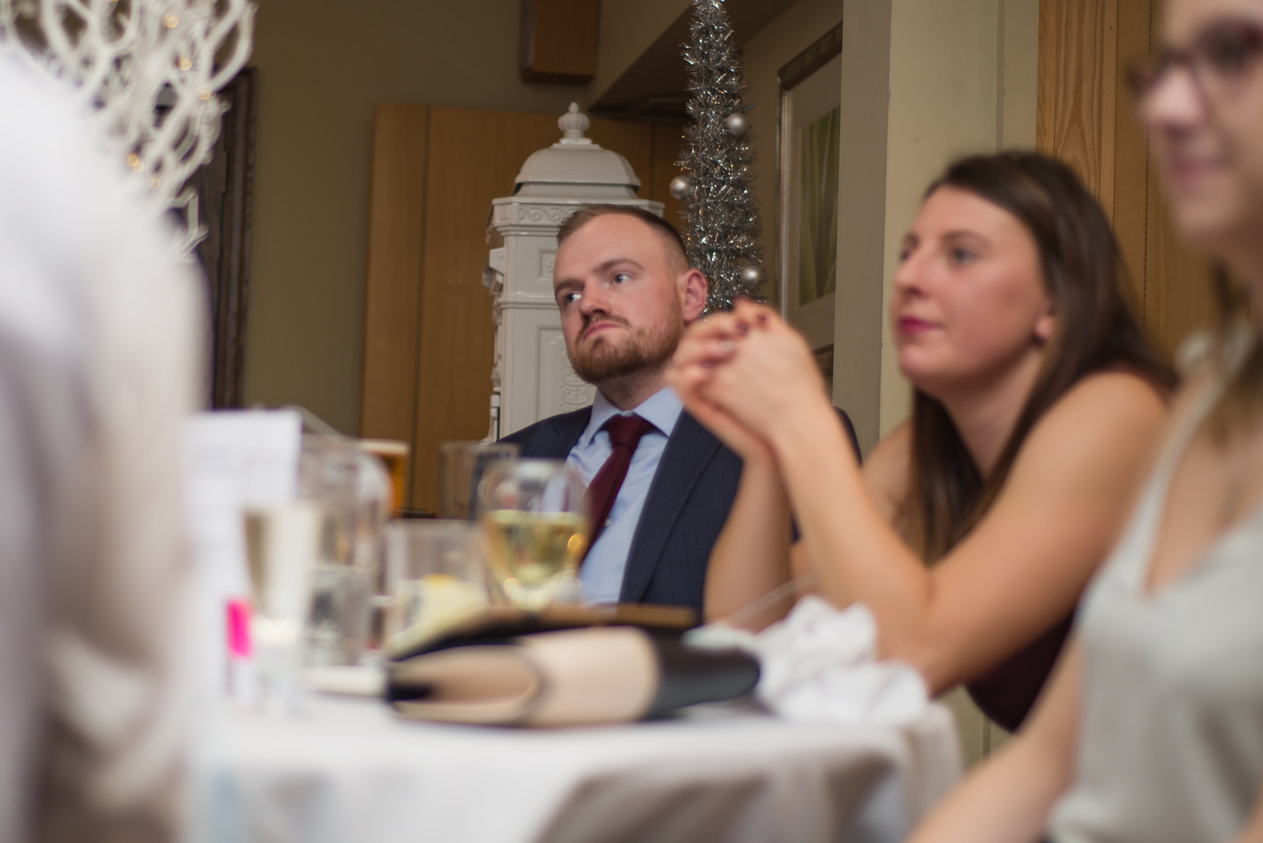 wedding photography and wedding videography, groomsmen trying not to cry at grooms speech