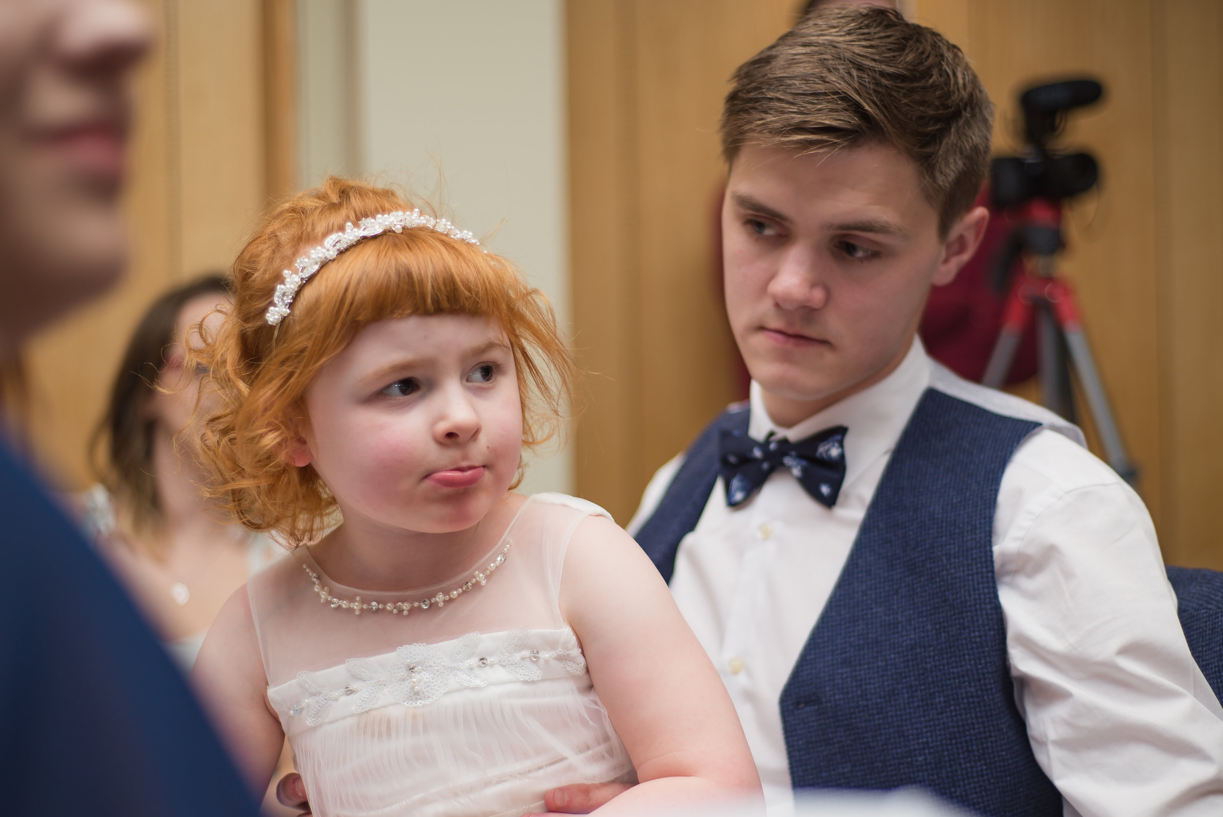 wedding photography and wedding videography, flower girl enjoying herself