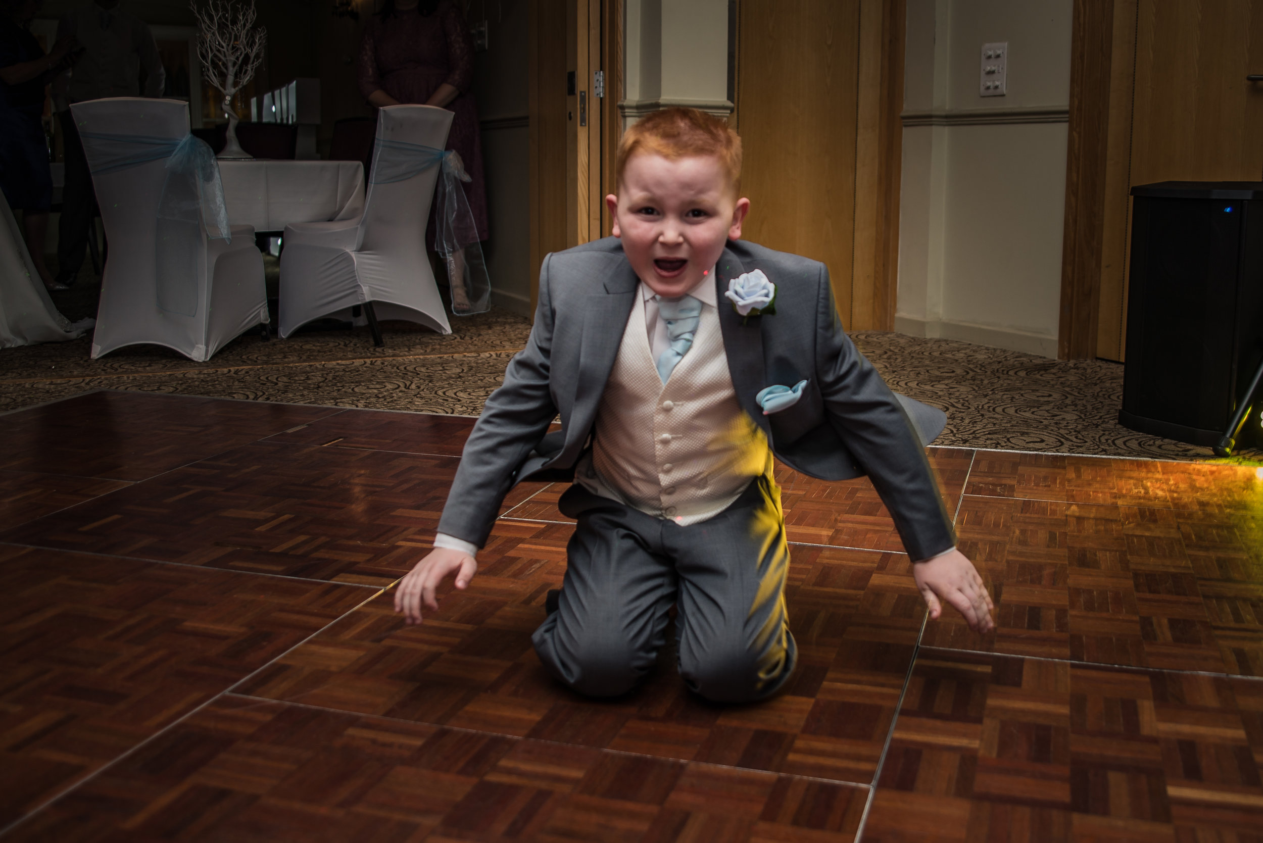 wedding photography and wedding videography, slide on the dancefloor