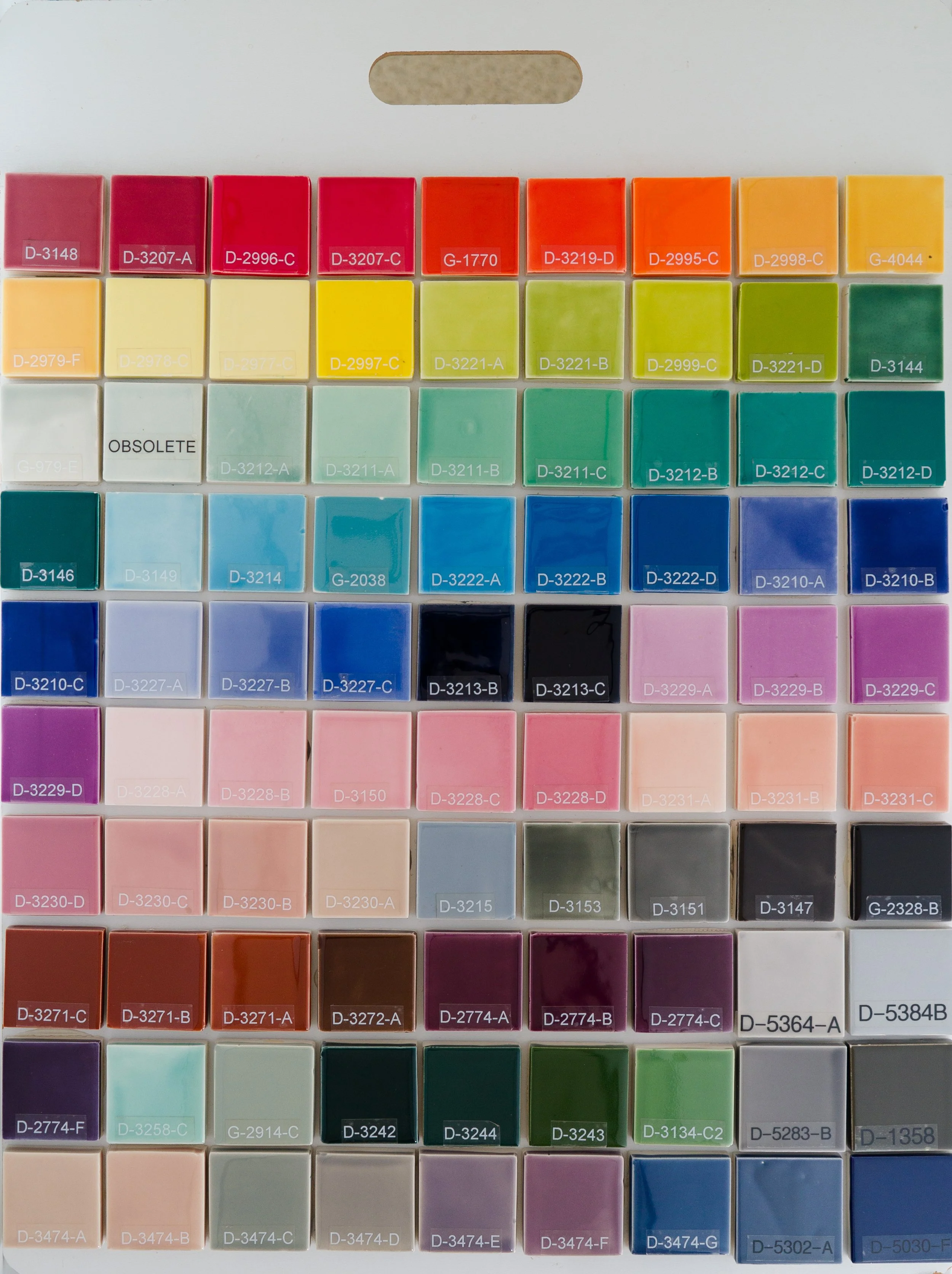 Sample display board 6 showing Gloss Glazes fired on Standard Bisque body at Cone 05. Codes ranges include D-3148 to D-5030-F.