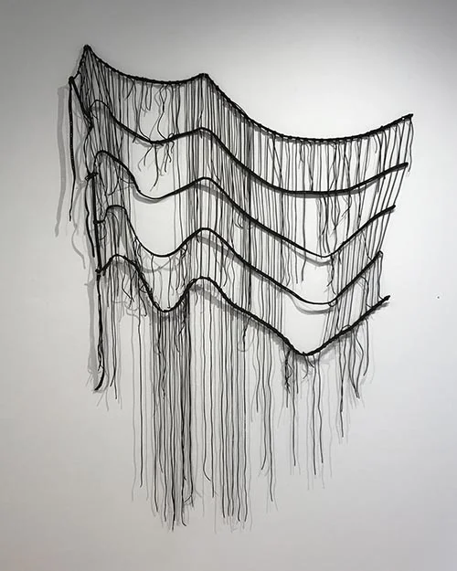 Carla Munsat: “All You Need Is…A Found Object,” leather, 72” X 48”.