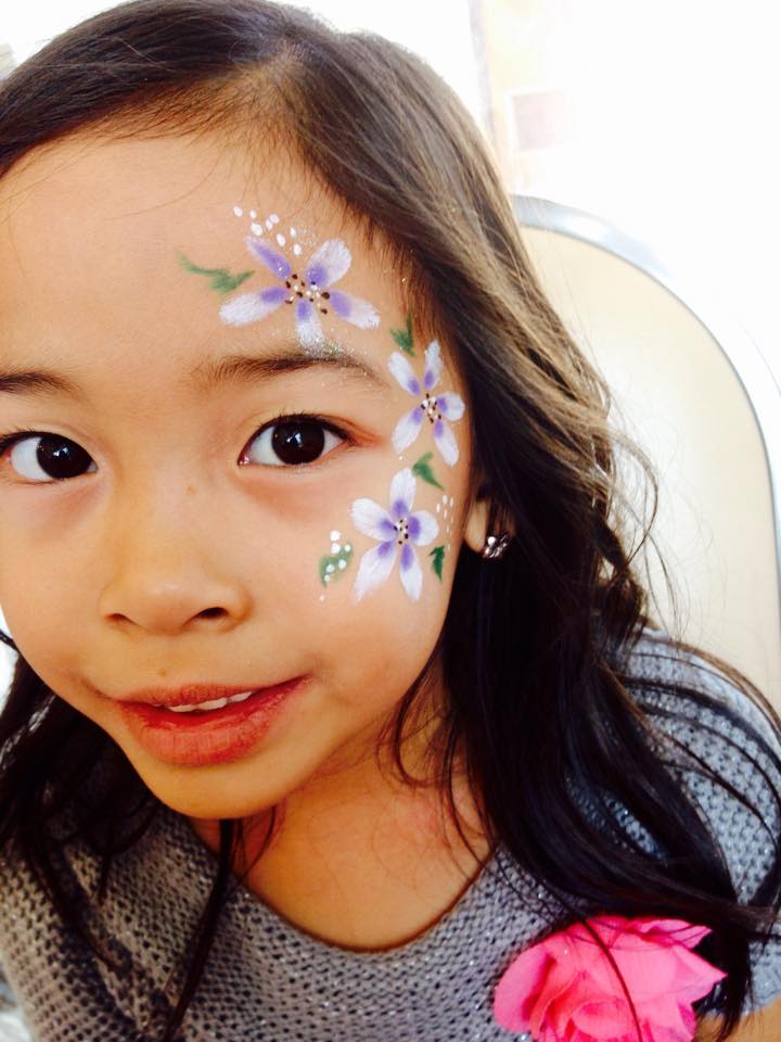 Facepaint Curly Qs flowers.jpg