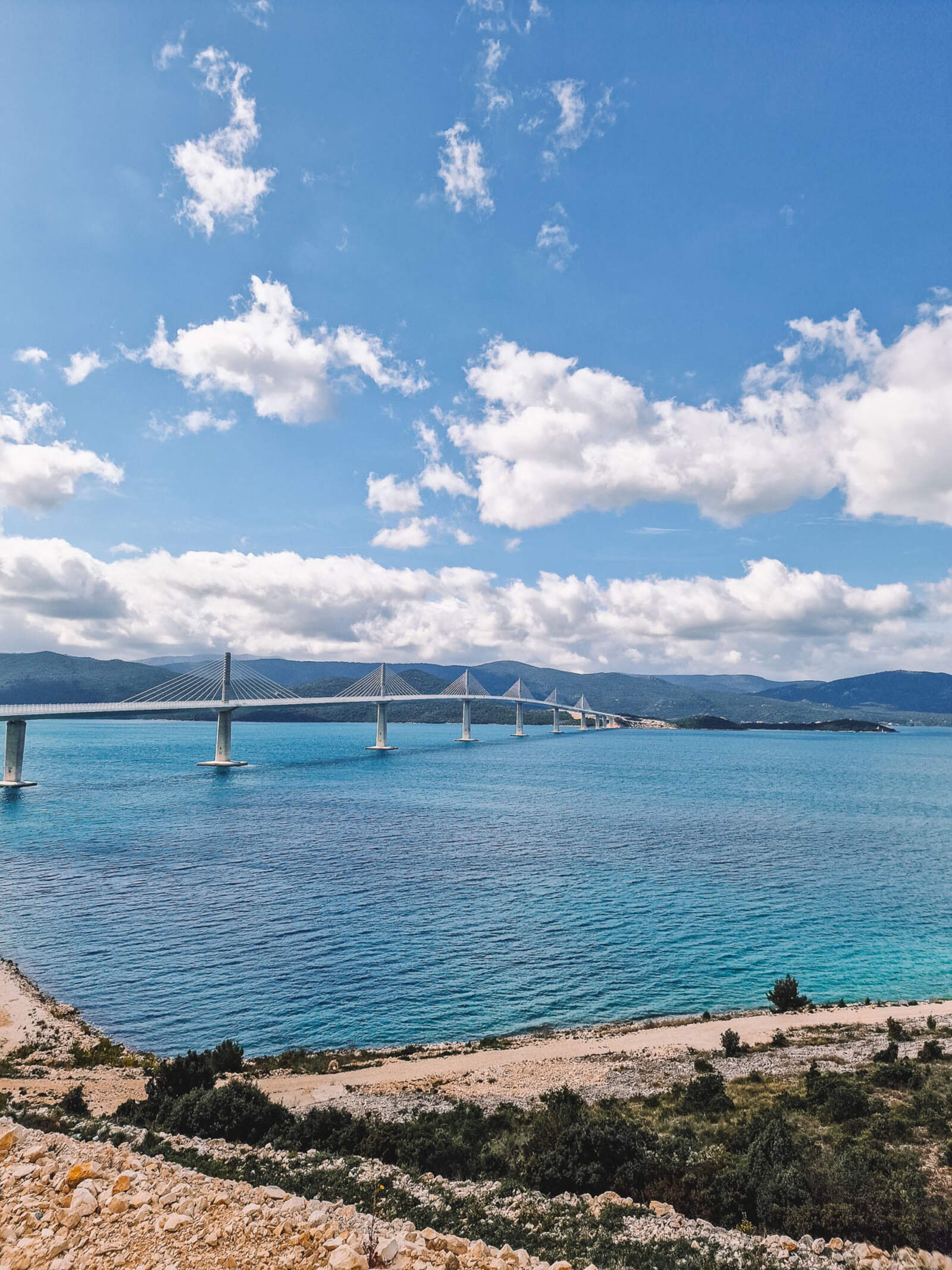 a long bridge crossing the sea between mainland Croatia and an island
