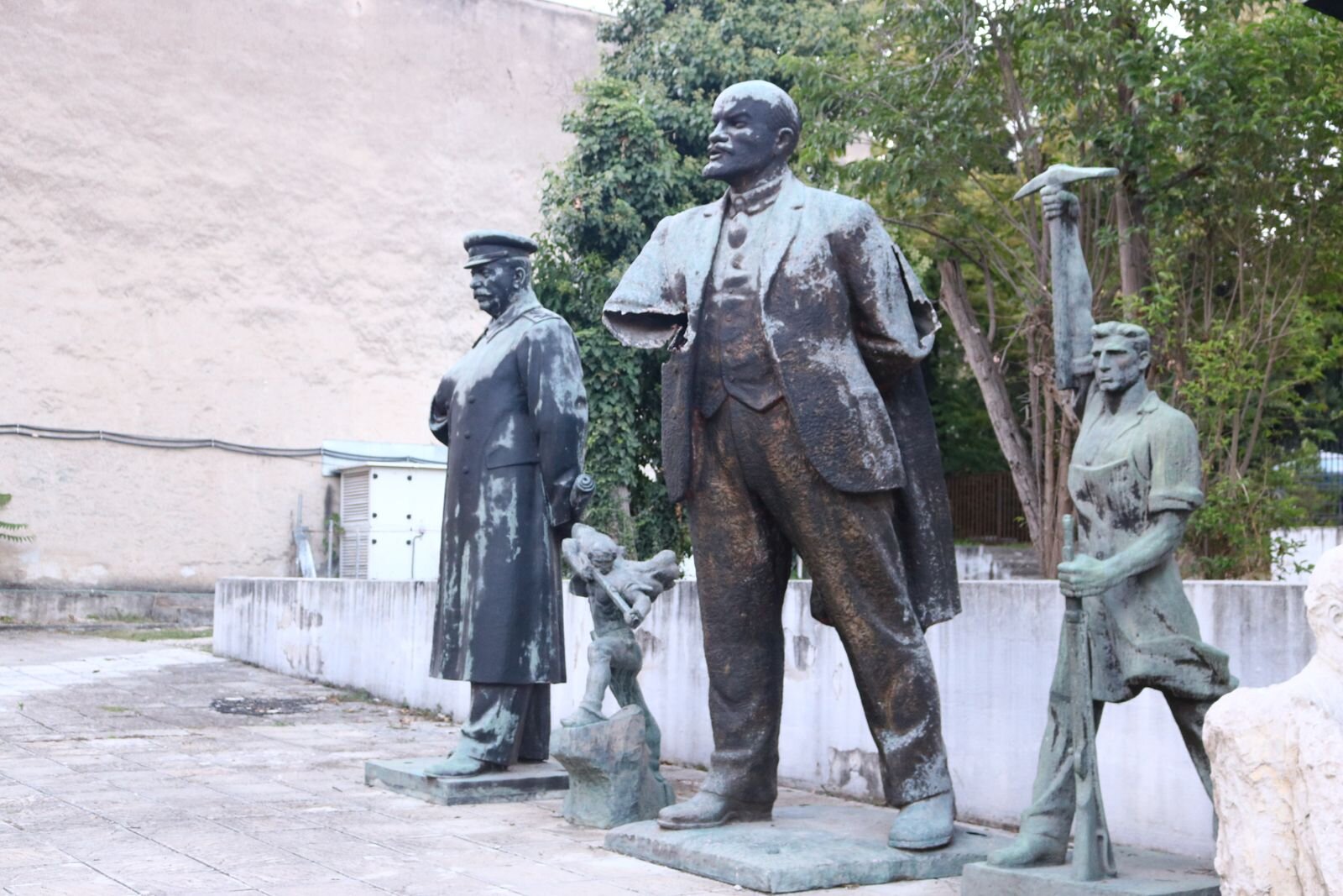 Communist statues torn down and now stored behind the museum building