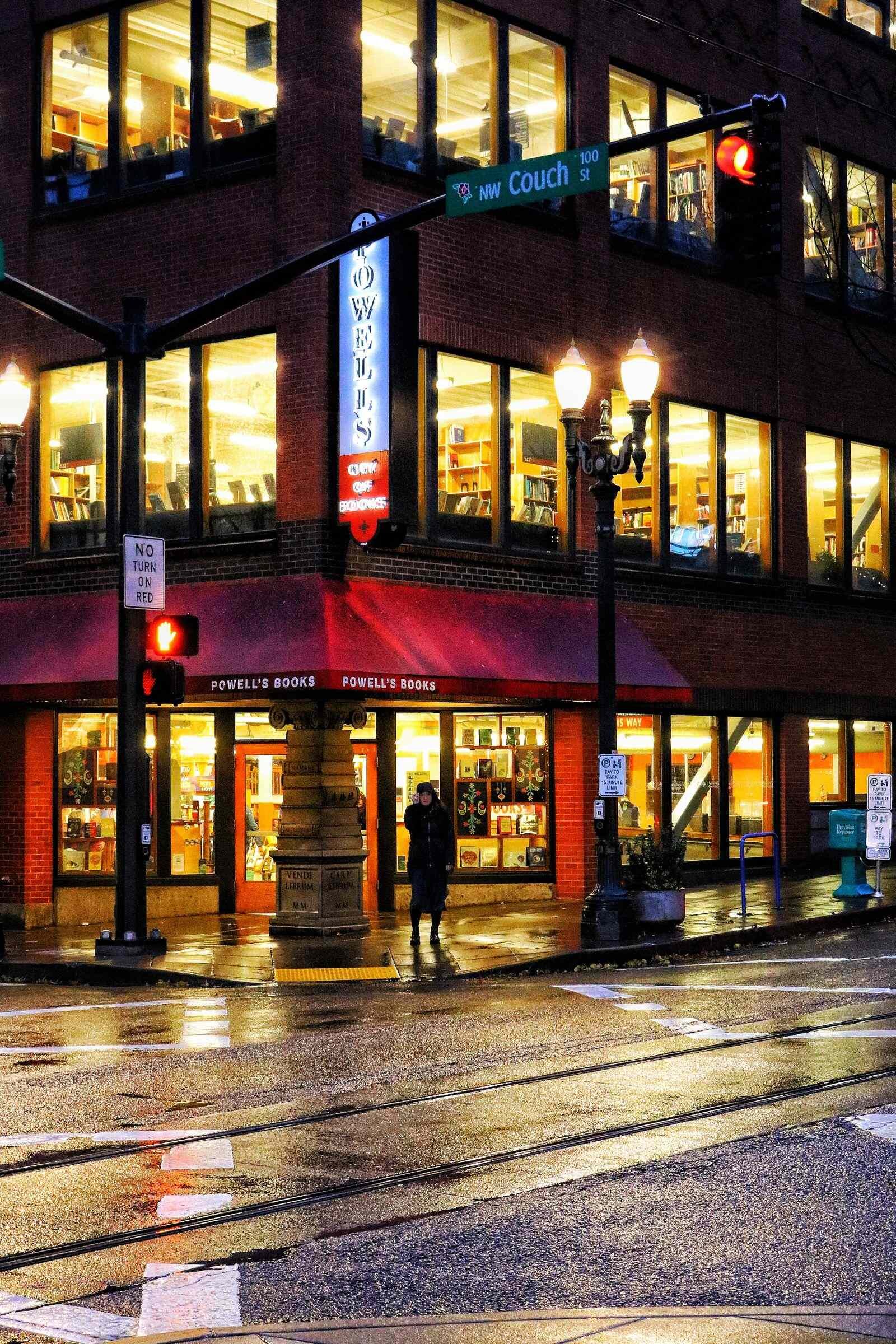 The brick exterior of Powells in Portland at night